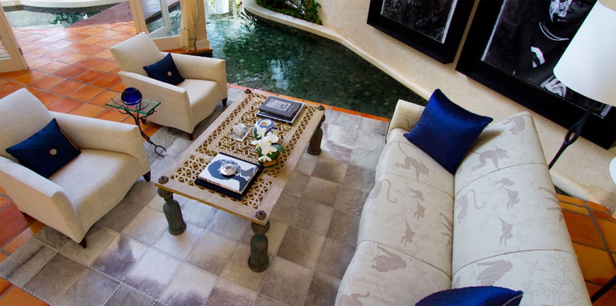 Seating area next to shallow pools at Roaring Pavilion, Jamaica