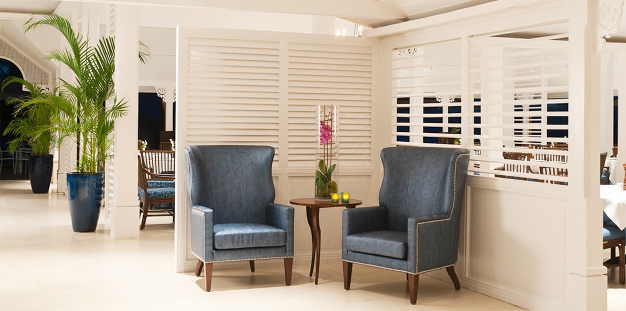 Seating outside of a dining area at The Body Holiday