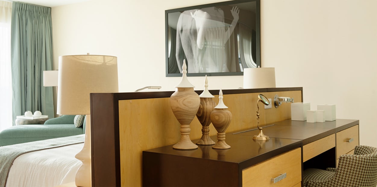 Desk and bed at The Body Holiday