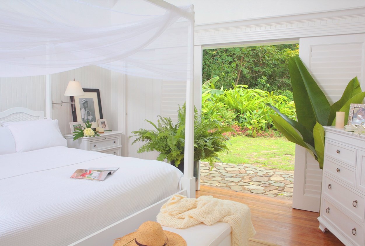 Bedroom with exit to the lawn at Viceroy Sugar Beach