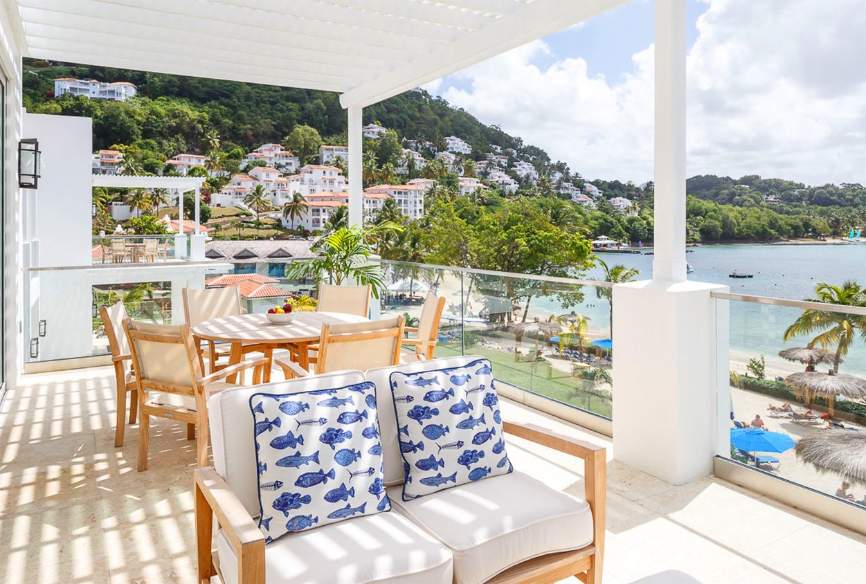 Balcony seating and table at Windjammer Landings
