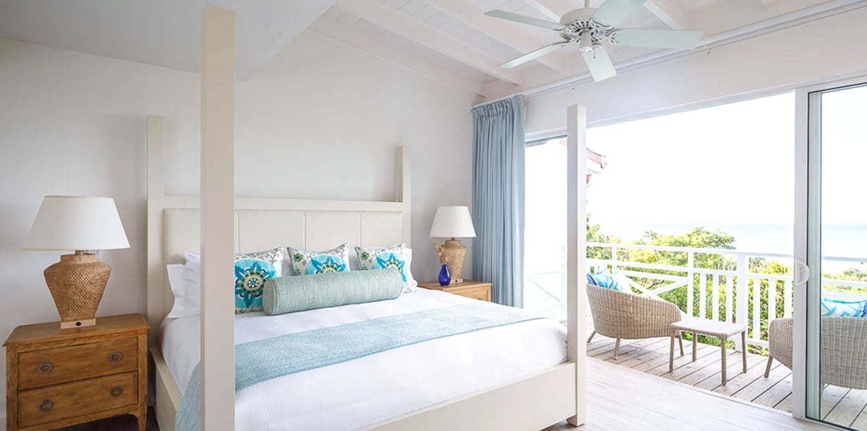 Bed and balcony at Windjammer Landings