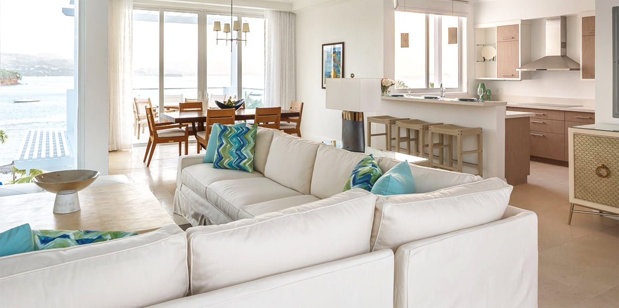 Seaing area, dining table, and kitchen at Windjammer Landings