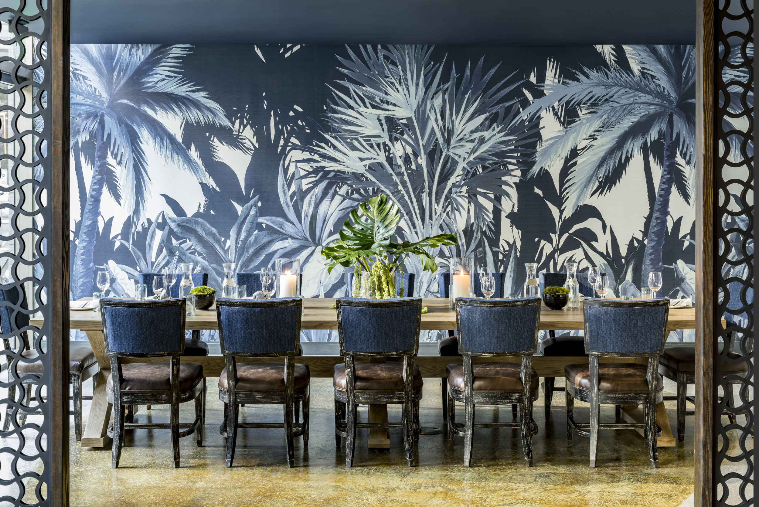 River Oyster Bar Private Dining Room with wallpaper and blue chairs